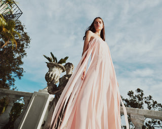 STATEMENT GOWNS